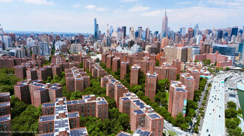 Vista aérea de los edificios en cuyas azoteas se instalarán los sistemas de autoconsumo con los rascacielos de Manhattan al fondo. 